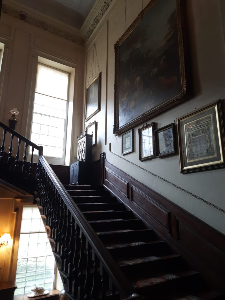 CALKE ABBEY STAIRCASE AT THE ENTRANCE TO THE ABBEY