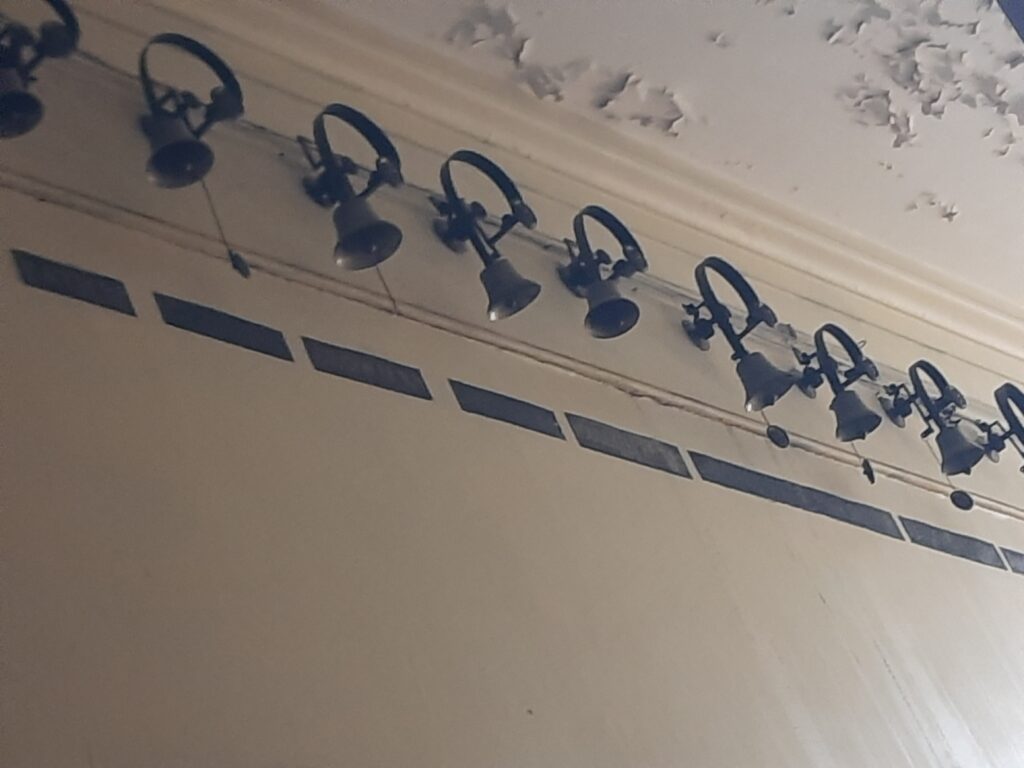 CALKE ABBEY SERVANTS BELLS ON THE WALL